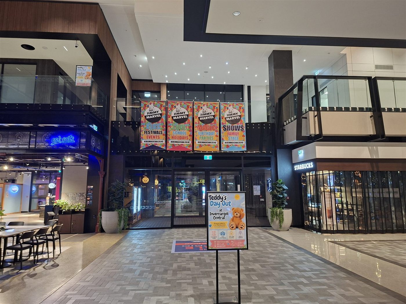 Jimmy Marvel banners and Teddy's Day Out signage at Invercargill Central