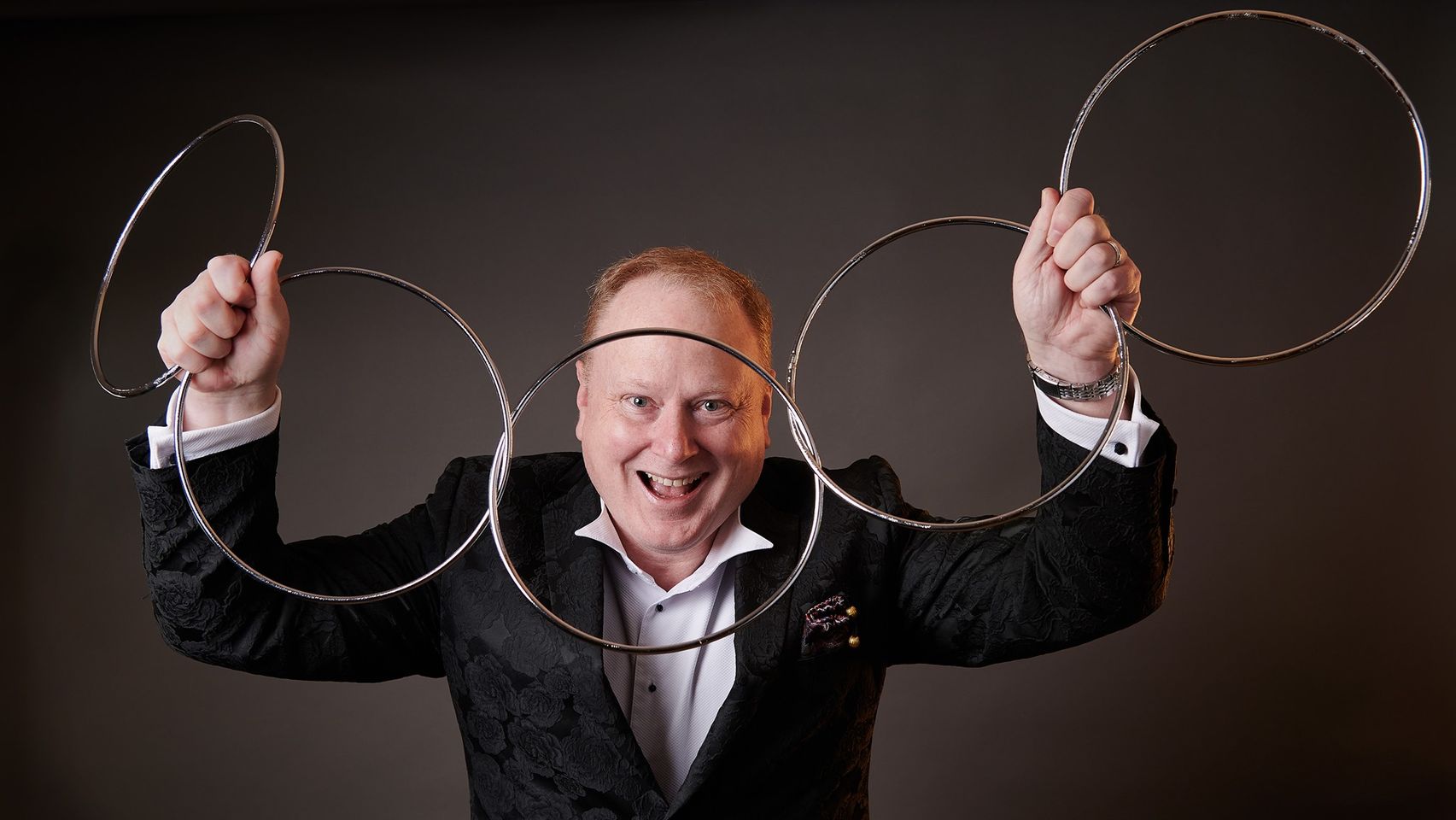 Jimmy Marvel performing with linking rings